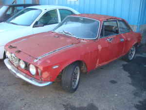 1966_Alfa_Romeo_Giulia_Sprint_GT_Rust_Restoration_Project_Driver_Side.jpg