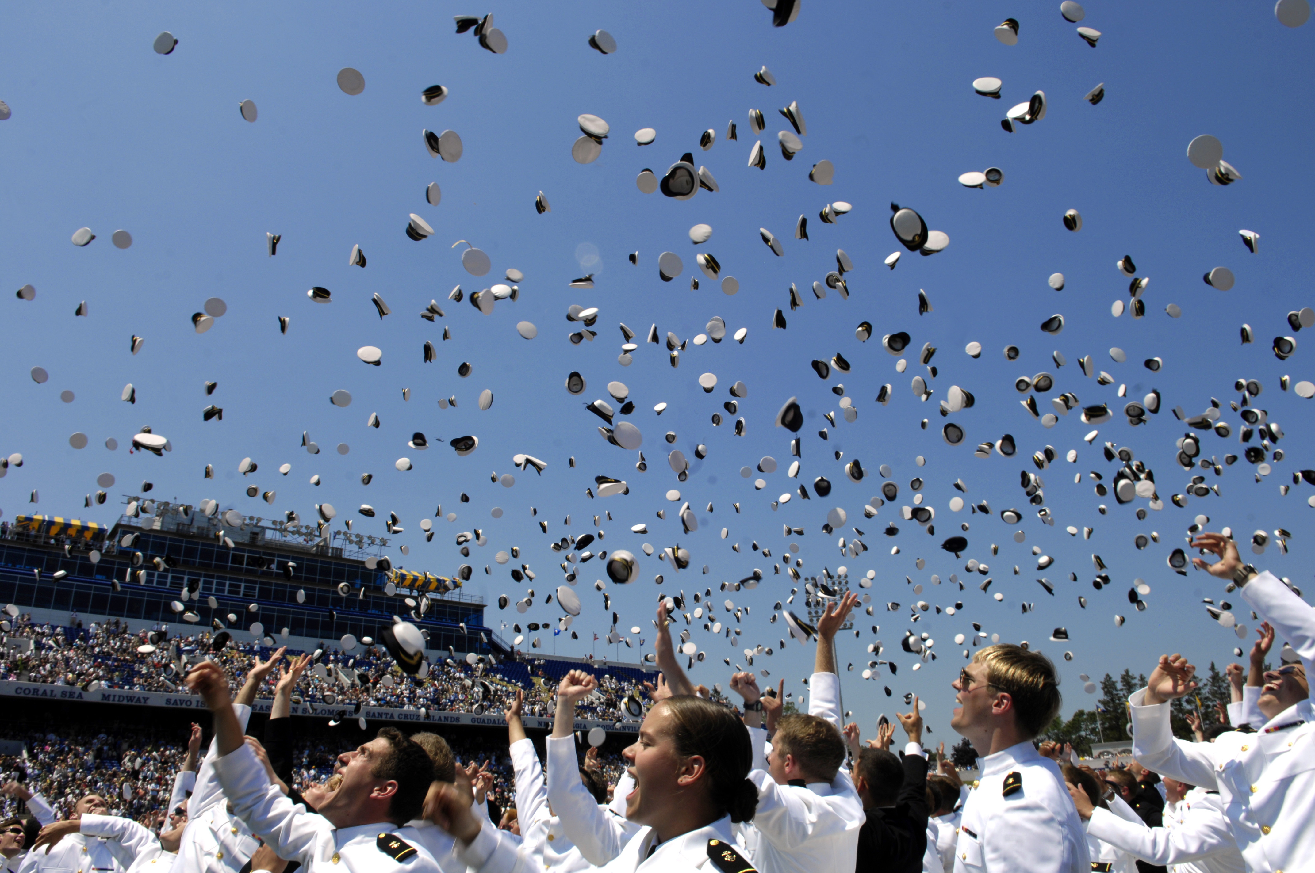 Traditional_hat_toss_celebration_at_graduation_from_United_States_Naval_Academy.jpg